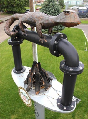 Custom-formed Salamander, fabricated logs with working fire-pit.